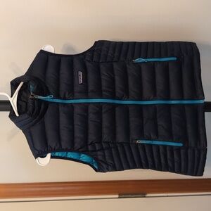 Patagonia puffy vest, dark blue with aqua accents size medium